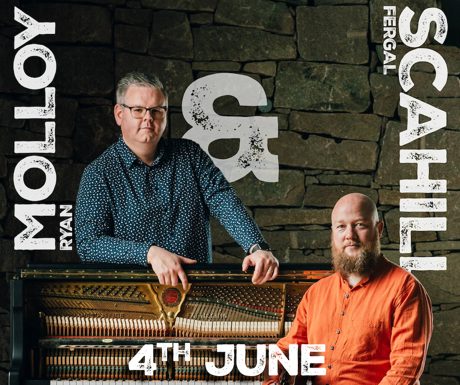 Two men, one standing and one sitting, pose behind an open upright piano against a stone wall. Text reads: Ryan Molloy & Fergal Scahill, 4th June.